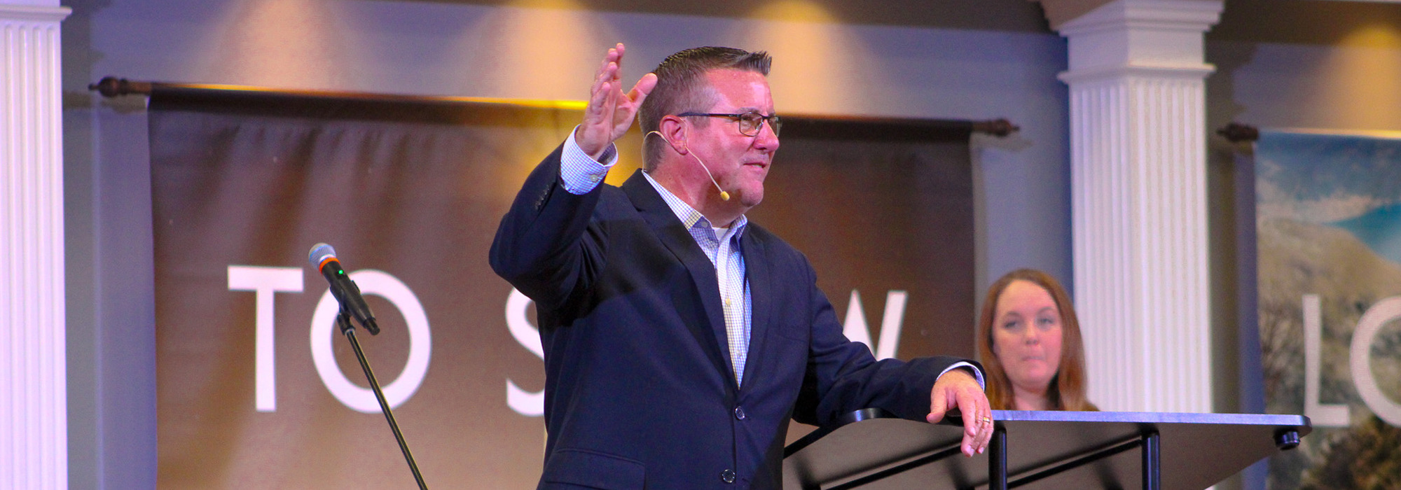 Mike smiling while preaching